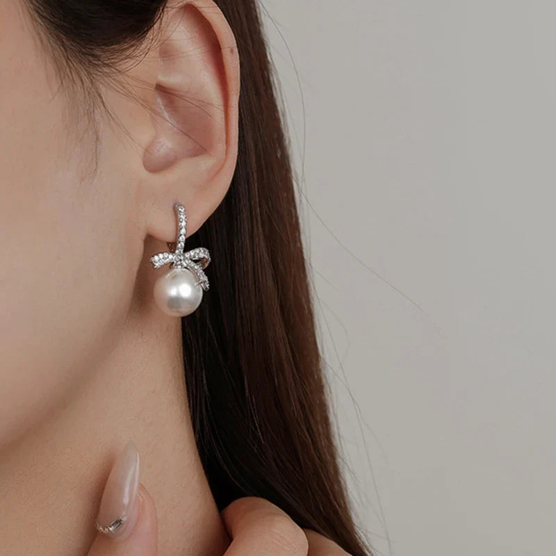 Dazzling Bowtie Ribbon Pearl Clear CZ Errings