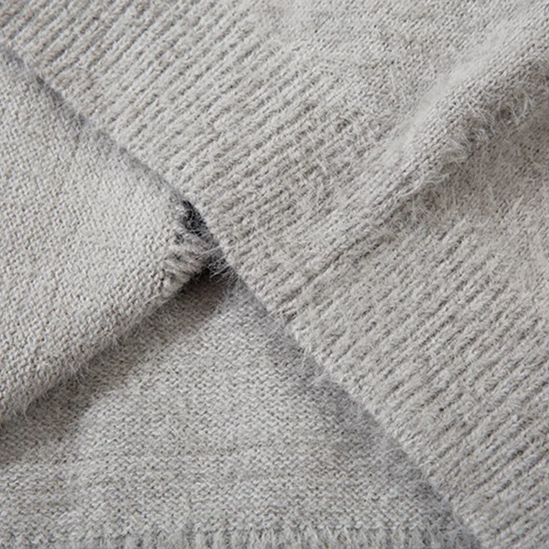 details of the gray Vintage Zipper Spider Web Sweater showing the fabric