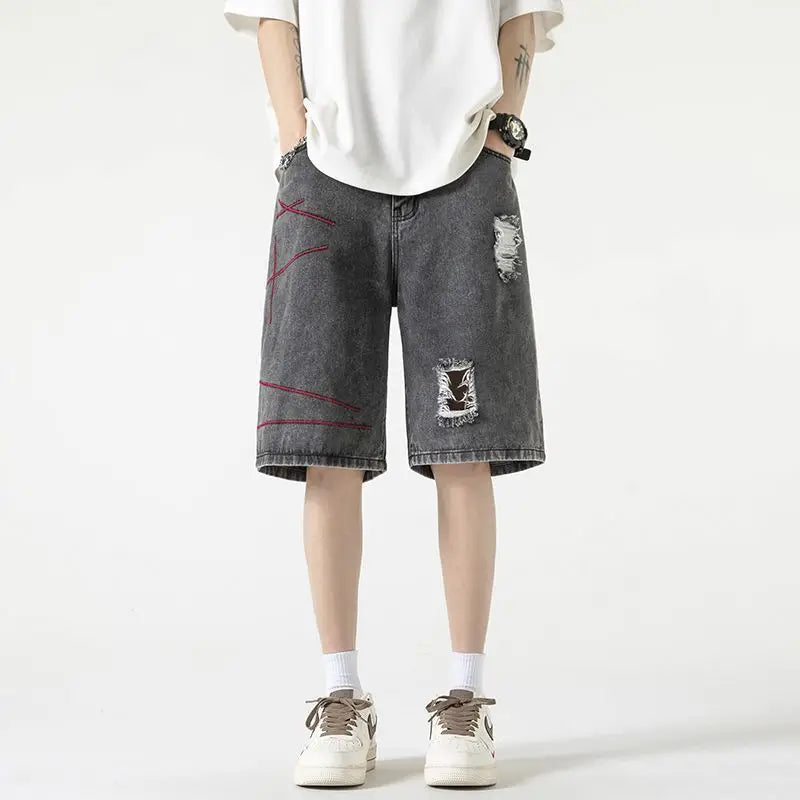 Stylish Spliced Button Zipper Ripped Shorts