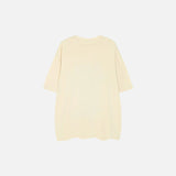 back vie of the beige Devil & Angel Loose T-shirt in a gray background