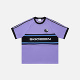 Front view of the purple Y2K Sports Striped Patchwork T-shirt in a gray background from DAXUEN.