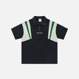 Front view of the black Retro Zip-up Polo Patchwork T-shirt in a gray background from DAXUEN