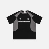 Front view of the black Retro Racing Patchwork T-shirt in a gray background from DAXUEN.