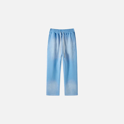 Front view of the sky blue Casual Noir Relax Pants in a gray background
