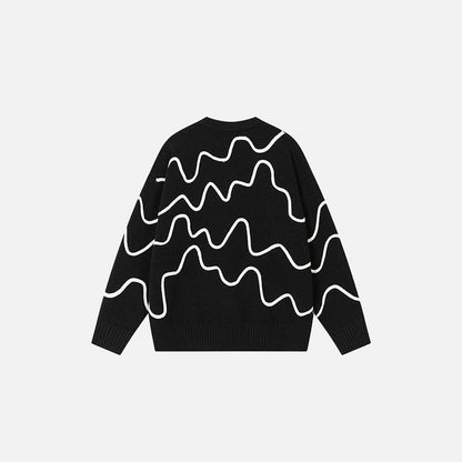 Back view of the black Wave Pattern Sweater in a gray background 