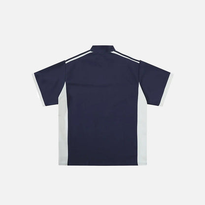 Back view of the blue Y2K Half Zipper Graphic T-shirt in a gray background 