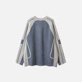 Back view of the gray Raglan Sleeve Zip-Up Sweater in a gray background