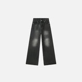 Front view of the washed black Wide-Leg Vintage Denim Jeans in a gray background