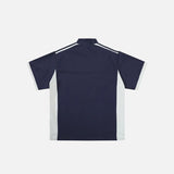 Back view of the blue Y2K Half Zipper Graphic T-shirt in a gray background 