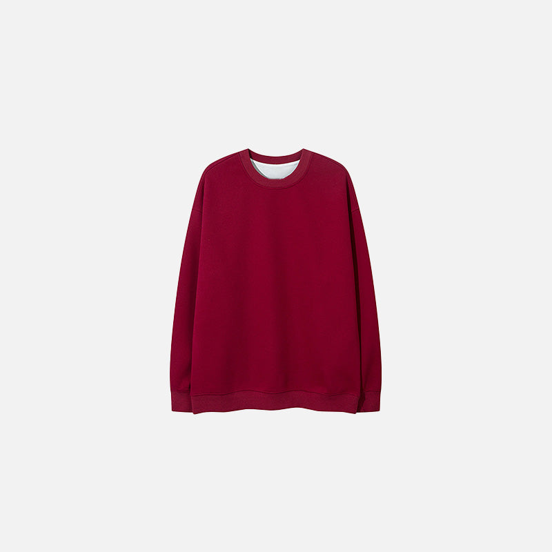 Front view of the red Classic Crewneck Sweater in a gray background