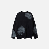 Back view of the black Shadow Chains Knit Sweater in a gray background