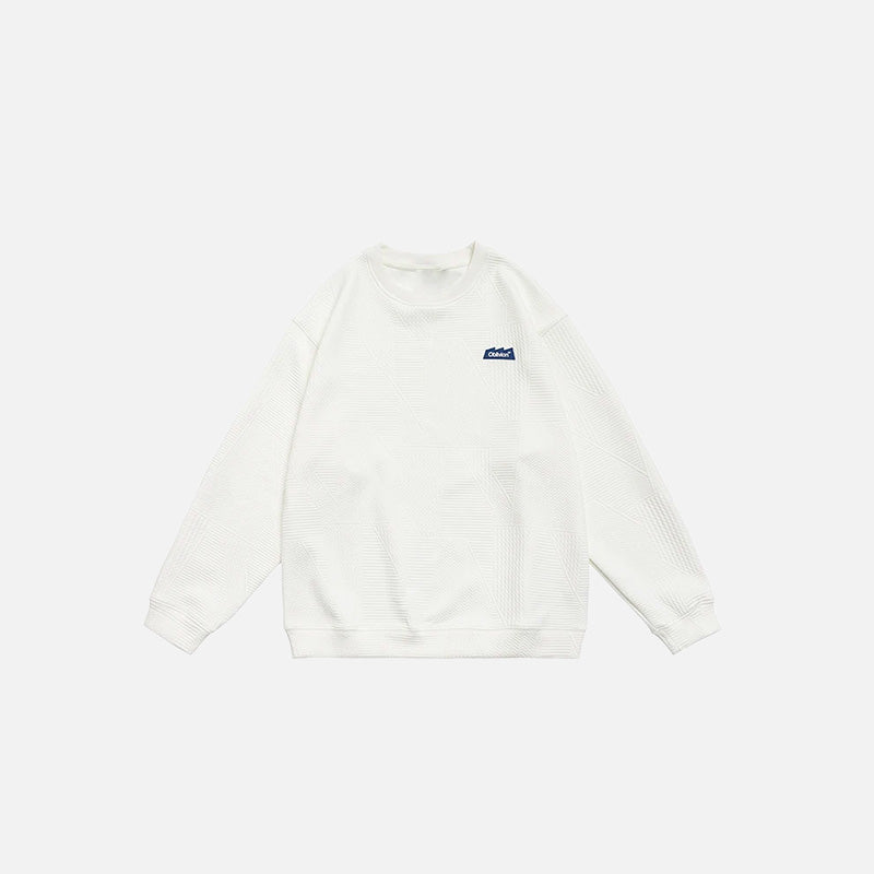 Front view of the beige Solid Embroidered Sweatshirt in a gray background