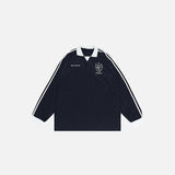 Front view of the blue Heritage Stripe Long Sleeve T-shirt in a gray background