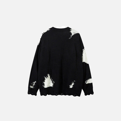 Back view of the black & white Ragged Rebel Sweater in a gray background