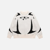 White color of the Y2K Stars Graphic Sweaters in a gray background