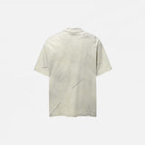 Back view of the grey Embroidered Patch Punk T-Shirt in a gray background