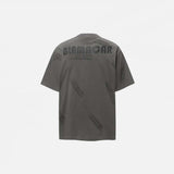 Back view of the grey Vintage Grunge Patch T-Shirt in a gray background