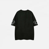 Back view of the black Vintage Oversized Embroidered T-Shirt in a gray background