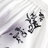 High street graffiti spray dye shorts