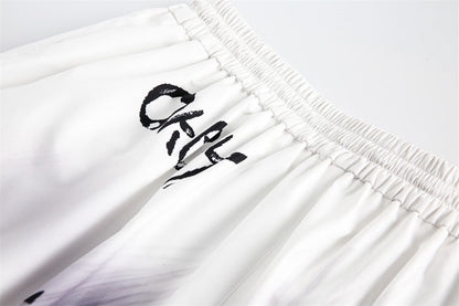 High street graffiti spray dye shorts