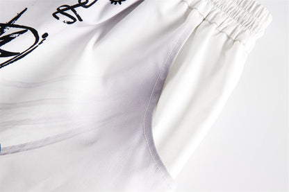 High street graffiti spray dye shorts
