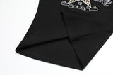 DAXUEN Leopard star graphic t-shirt with gothic text