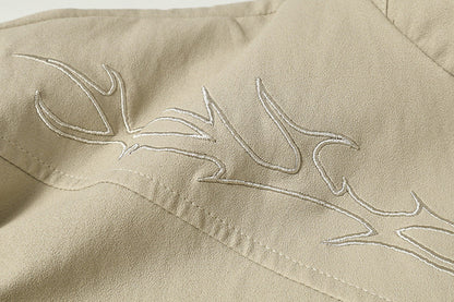 DAXUEN Embroidered bomber jacket in black and beige