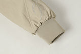 DAXUEN Embroidered bomber jacket in black and beige