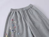 DAXUEN Baggy graphic sweatpants with colorful motifs