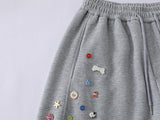 DAXUEN Baggy graphic sweatpants with colorful motifs