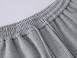 DAXUEN Baggy graphic sweatpants with colorful motifs