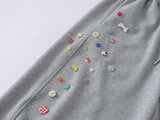 DAXUEN Baggy graphic sweatpants with colorful motifs