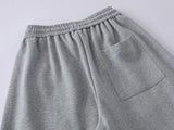 DAXUEN Baggy graphic sweatpants with colorful motifs