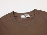 DAXUEN Oversized graphic T-shirt with human figures and text