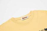 DAXUEN Oversized short-sleeved T-shirt with graphic text and star patches