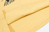 DAXUEN Oversized short-sleeved T-shirt with graphic text and star patches