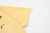DAXUEN Oversized short-sleeved T-shirt with graphic text and star patches