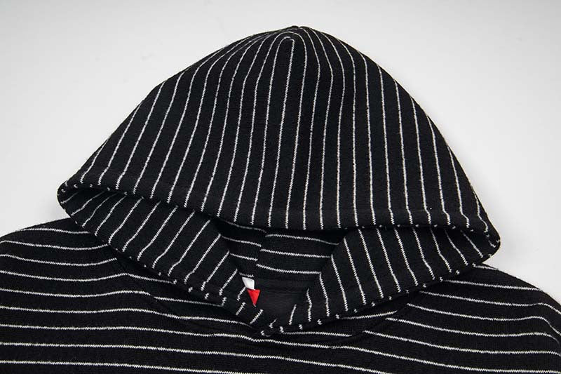DAXUEN Oversized striped hoodie with 'Made' text