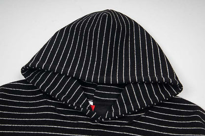 DAXUEN Oversized striped hoodie with 'Made' text