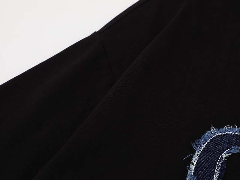 DAXUEN Oversized T-shirt with cat graphic and text