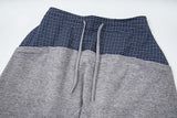 DAXUEN Wide-leg trousers with two-tone design and plaid panel