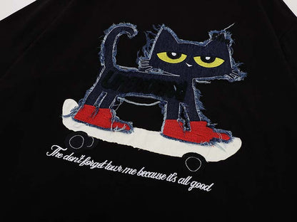 DAXUEN Oversized T-shirt with cat graphic and text