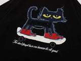 DAXUEN Oversized T-shirt with cat graphic and text