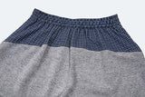DAXUEN Wide-leg trousers with two-tone design and plaid panel