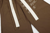 DAXUEN Graphic wide-leg trousers in black and mocha