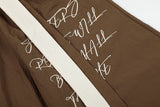 DAXUEN Graphic wide-leg trousers in black and mocha