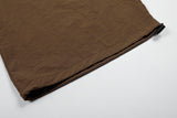 DAXUEN Graphic wide-leg trousers in black and mocha