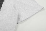 DAXUEN Crew neck graphic T-shirt with abstract flag print