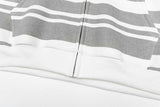 DAXUEN Distressed text oversized hoodie with stripes