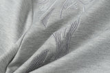 DAXUEN Short-sleeved crew-neck T-shirt with horse head embroidery